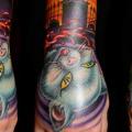 Arm Fantasy Hand Cat tattoo by Tim Kerr