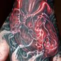 Biomechanical Heart Hand tattoo by Tim Kerr