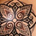 Shoulder Flower Tribal tattoo by Border Line Tattoos