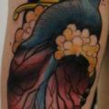 Arm Heart Dagger tattoo by Matt Adamson