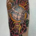 Arm Clock Old School Flower Lettering tattoo by Alans Tattoo Studio