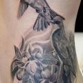 tatuaje Realista Lado Pájaro por Elvin Tattoo