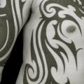 tatuaje Brazo Pecho Lado Tribal Dragón por Apocaript
