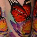 Realistic Flower Butterfly tattoo by Dark Art Tattoo