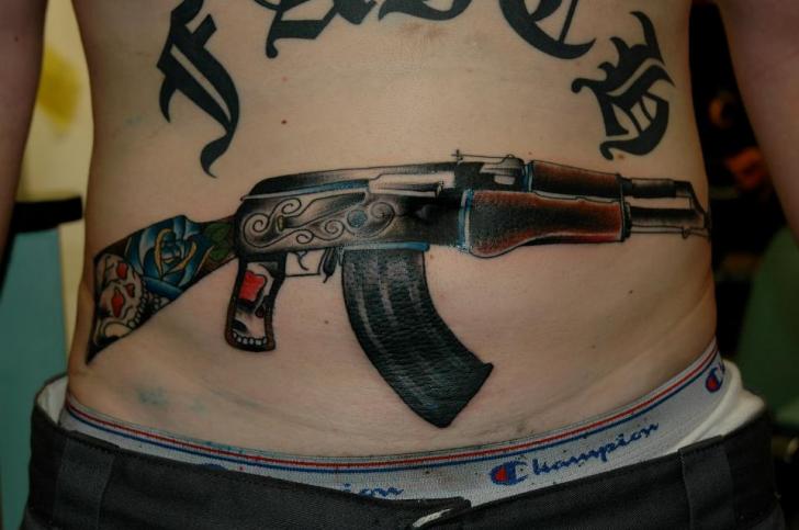 Gun Belly Tattoo by Chad Koeplinger