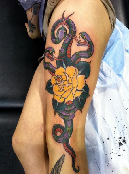 New School Snake Leg Flower Tattoo by Chad Koeplinger