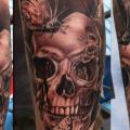 Arm Skull Butterfly tattoo by Morbida Tattoo
