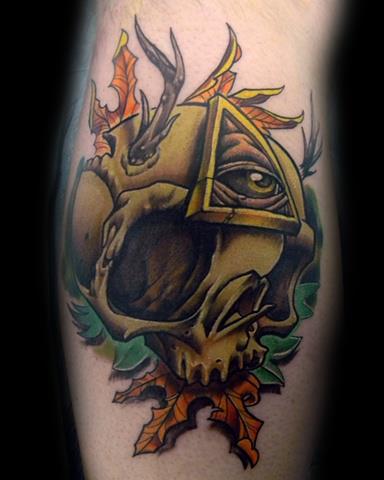 Arm Skull God Tattoo by Levy Hilton