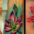 Shoulder Realistic Foot Flower tattoo by Delirium Tattoo