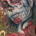 tatuaje Flor Lado Cráneo mexicano por Dzy Tattoo