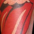 Arm Fantasie Mund Zunge tattoo von Art and Soul Tattoo