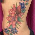 Realistic Flower Side tattoo by Art and Soul Tattoo