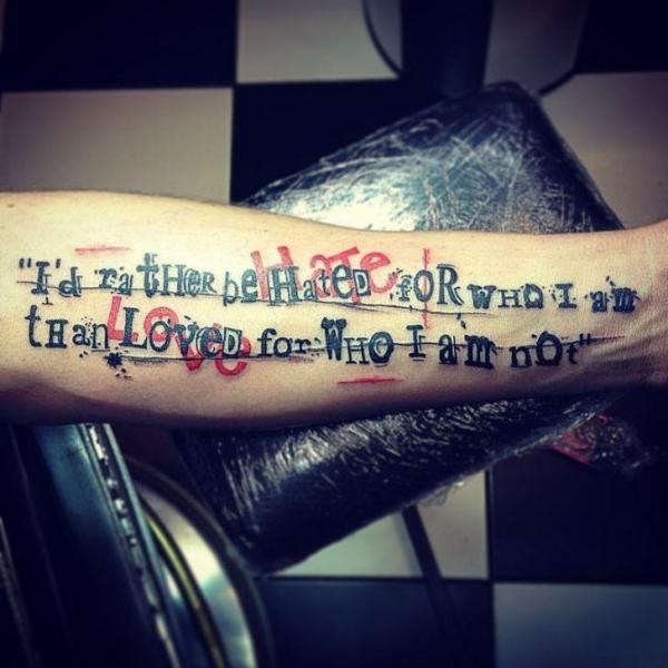 Arm Lettering Trash Polka Tattoo by World's End Tattoo