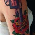 Arm Old School Flower Gun tattoo by World's End Tattoo