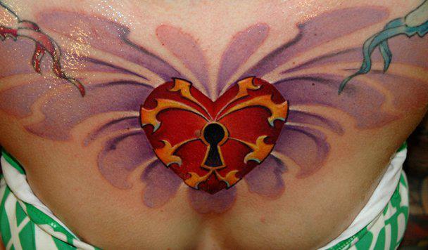 Heart Breast Lock Tattoo by Black Rose Tattoo