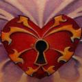 Heart Breast Lock tattoo by Black Rose Tattoo