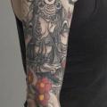 tatuaje Brazo Flor Buda Religioso por Shane Tan