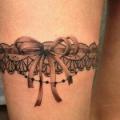 Realistic Ribbon Thigh Garter tattoo by Giahi