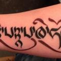 Arm Lettering tattoo by Q Tattoo