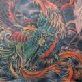 tatuaje Fantasy Espalda Fénix por Skin Deep Art
