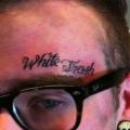 Lettering Face tattoo by Stay True Tattoo