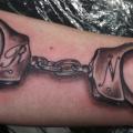 Arm 3d Handcuffs tattoo by Stay True Tattoo