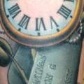 tatuaje Brazo Realista Reloj por Art Junkies Tattoos