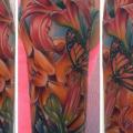 Arm Realistic Flower Butterfly tattoo by Art Junkies Tattoos