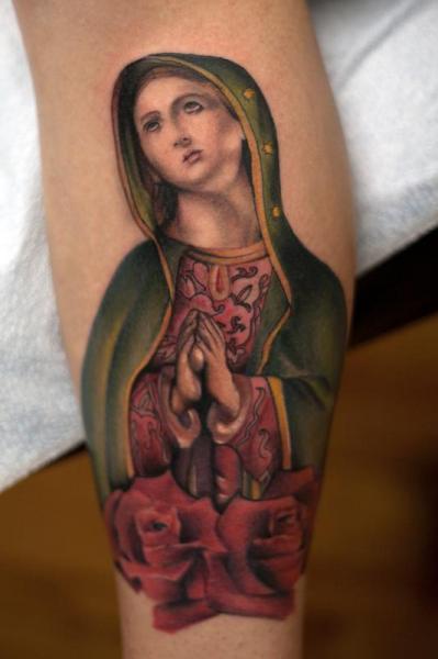 Tatuaggio Braccio Religiosi di Art Junkies Tattoos