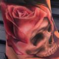 tatuaje Pie Flor Cráneo por Art Junkies Tattoos