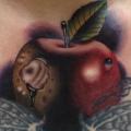 Chest Apple tattoo by Andres Acosta