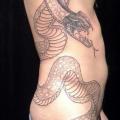 Schlangen Seite tattoo von Tantrix Body Art