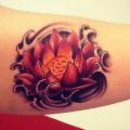 Arm Lotus Flower tattoo by Fatih Odabaş