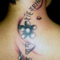 Blumen Leuchtturm Rücken Nacken tattoo von Crossover