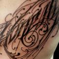 Side Lettering tattoo by Three Kings Tattoo