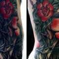 tatuaje Lado Mujer Cuervo por Three Kings Tattoo