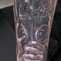 tatuaggio Braccio Maschera Bomba di Faith Tattoo Studio