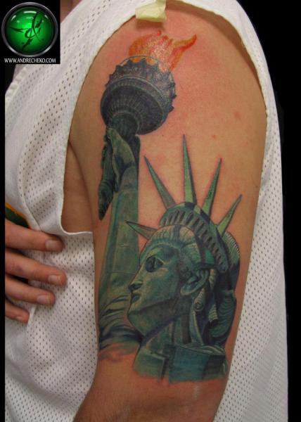 Arm Realistic Statue Liberty Tattoo by Andre Cheko