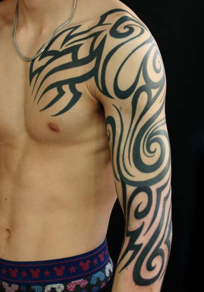 Shoulder Tribal Sleeve Tattoo by Van Tattoo Studio