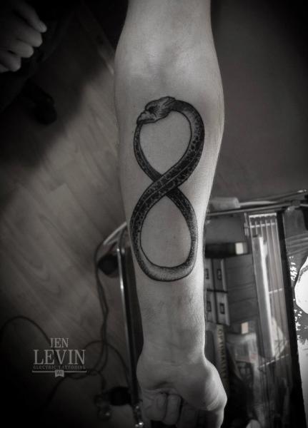 Tatuaje Brazo Dotwork Infinito por Ien Levin