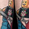 tatuaggio Polpaccio Chitarra Lego di Art Force Tattoo