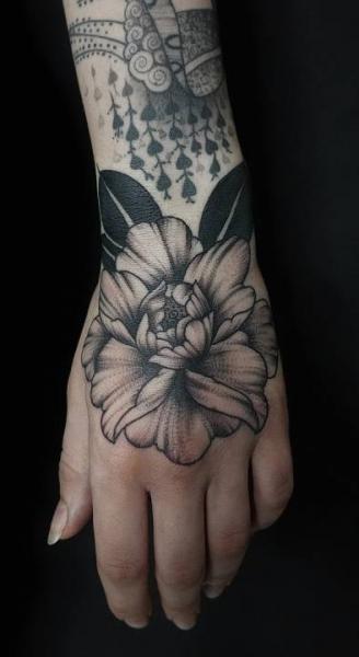 Flower Hand Tattoo by Art Force Tattoo