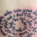 Lettering Back tattoo by Tattoo Nero