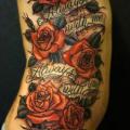 Flower Side Lettering tattoo by Kid Kros