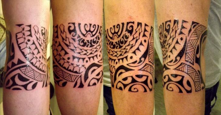 Arm Tribal Tattoo by Next Level Tattoo