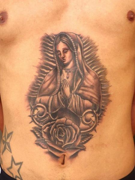 Tatuaggio Religiosi Pancia di Next Level Tattoo