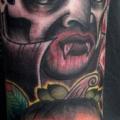 Arm New School Dracula tattoo by Front Line Tattoo