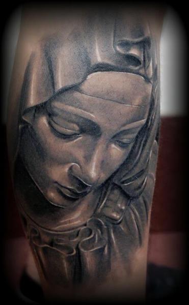 Arm Religious Statue Tattoo by Peter Tattooer