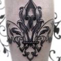 tatuaje Brazo Símbolo por Tattoo B52
