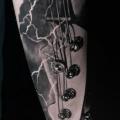 Arm Bass Guitar tattoo by Endorfine Studio